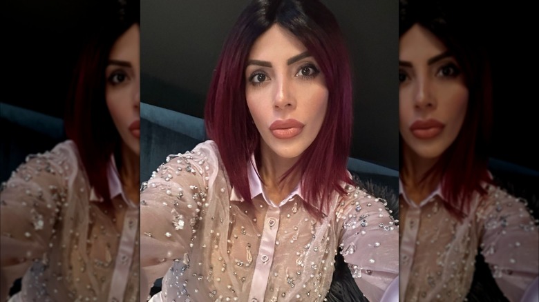 Jasmine Pineda taking a selfie in a wig.