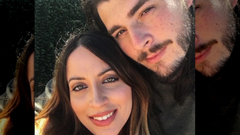 90 Day Fiancé's Amira and Andrew take an Instagram selfie