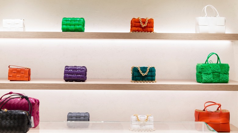 designer handbags on display at department store
