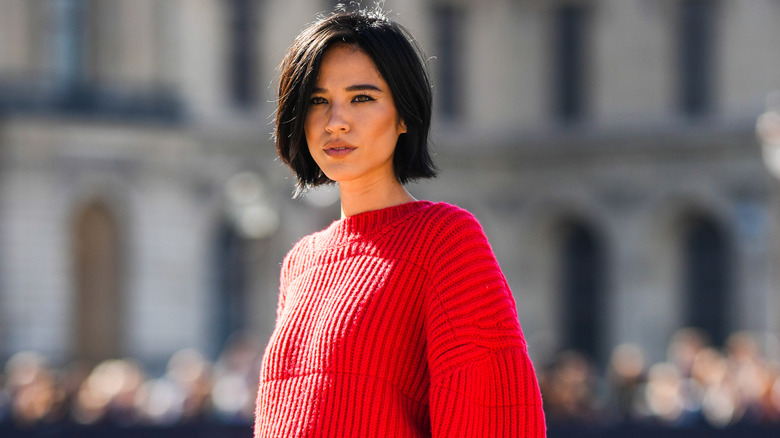 Kelsey Asbille posing outside