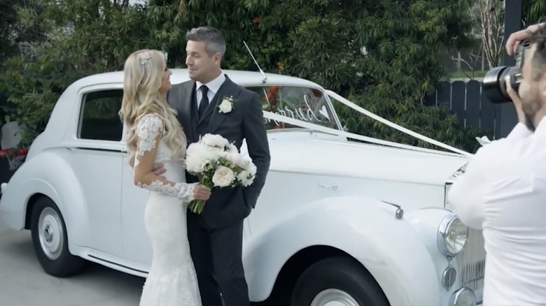 Christina Haack and Ant Anstead embrace during their wedding ceremony