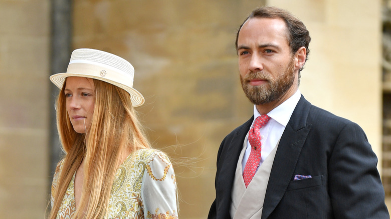 Alizee Thevenet and James Middleton walking