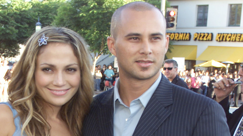 Jennifer Lopez and Cris Judd smiling