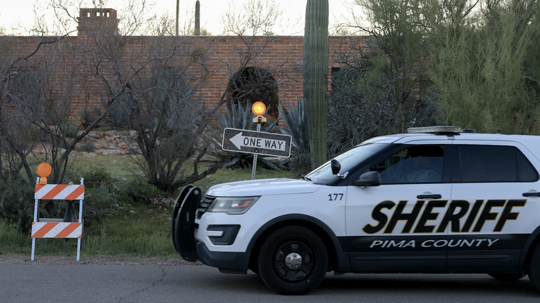 A Pima County Sheriff vehicle outside Nancy Guthrie's home