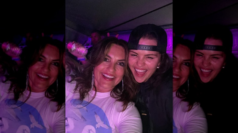 Mariska Hargitay and Selena Gomez smiling at the Eras Tour in 2023.