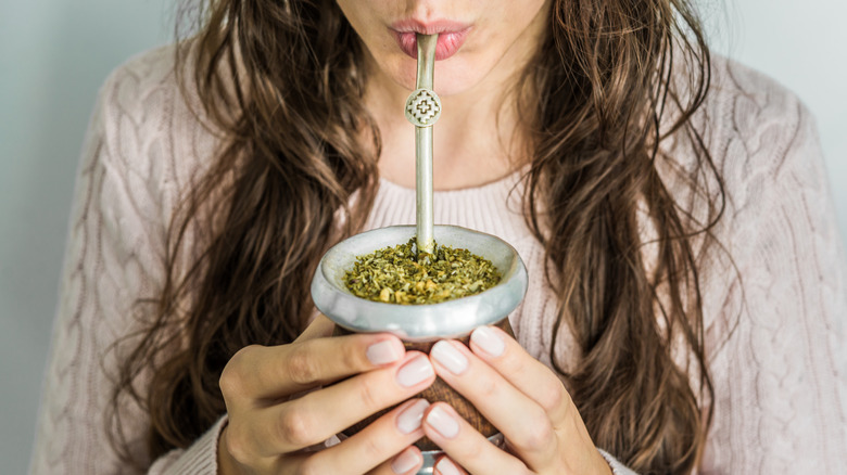 Woman drinking yerba mate