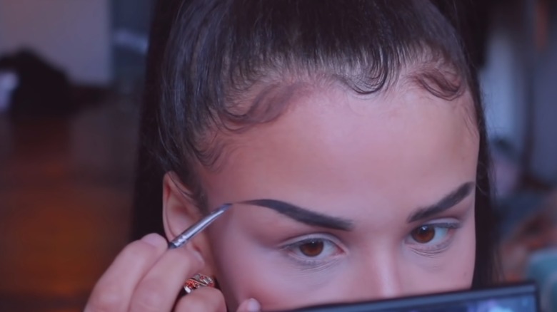 Snitchery drawing eyebrow tail