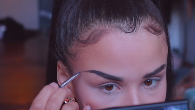 Snitchery drawing eyebrow tail