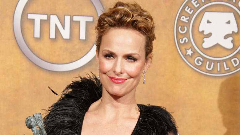 Melora Hardin smiling and posing.