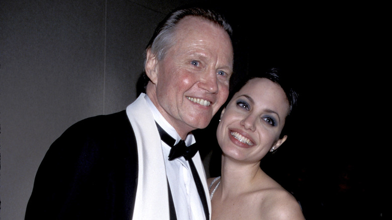 Angelina Jolie posing for photos with father Jon Voight