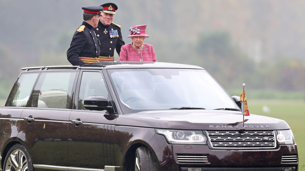 Queen Elizabeth riding In car