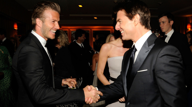 David Beckham and Tom Cruise shaking hands