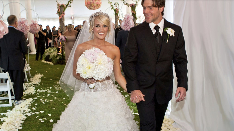 Carrie and Mike walking to wedding reception