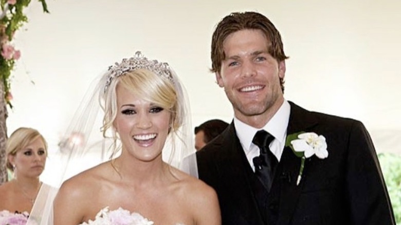 Carrie and Mike smiling on wedding day
