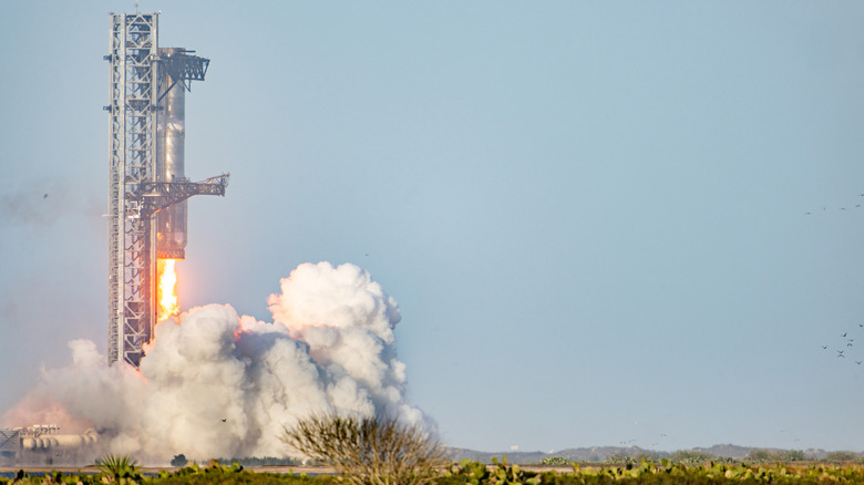 The SpaceX Starship Flight 8 booster returning to launch pad, March 2025