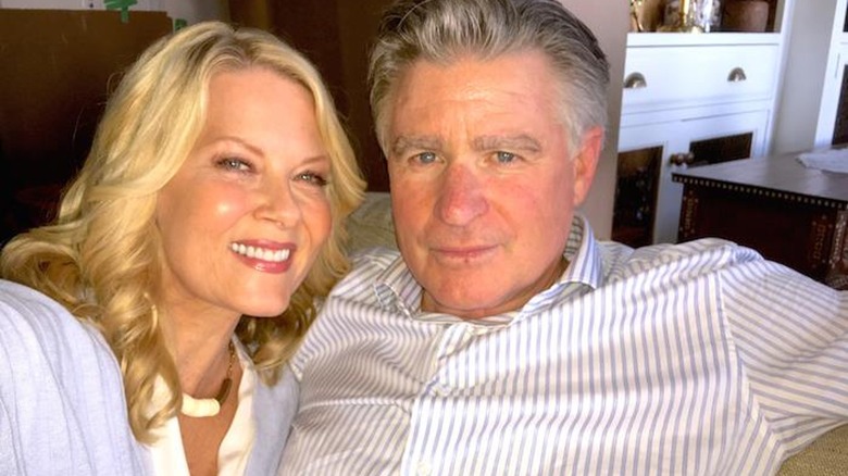 Treat Williams and Barbara Niven smiling