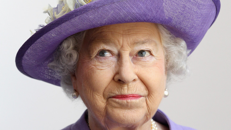 Queen Elizabeth II looking regal in purple