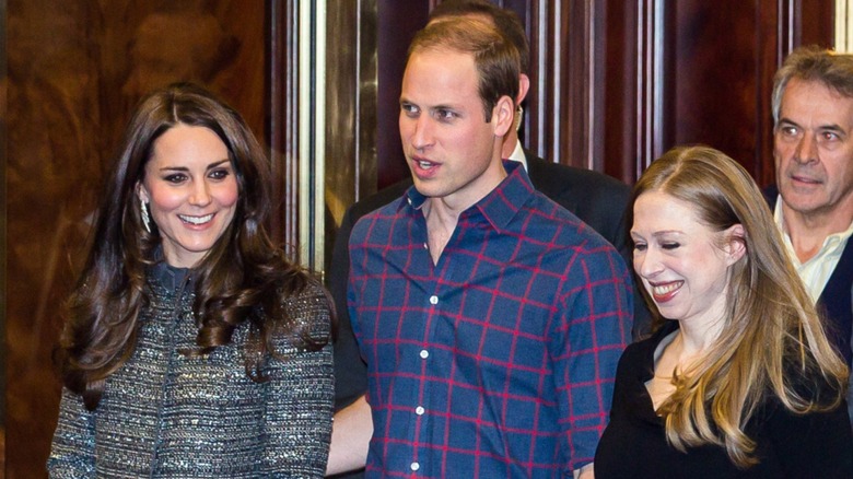 Kate Middleton, Prince William, Chelsea Clinton smiling, walking