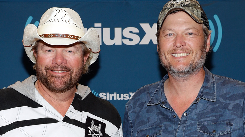 Toby Keith and Blake Shelton smiling