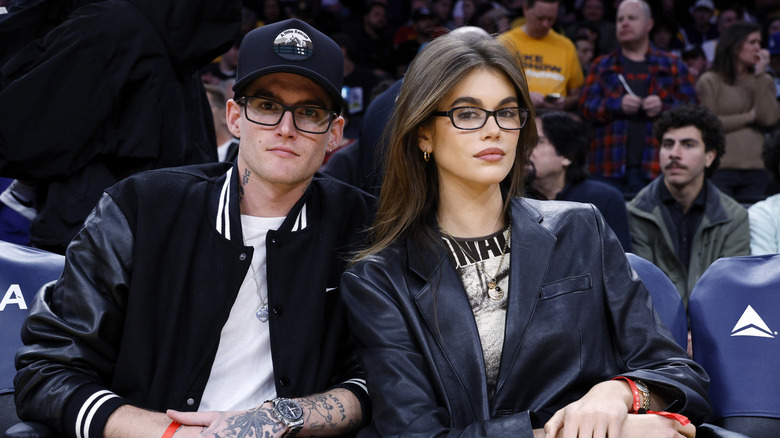Kaia Gerber and Presley Gerber at a basketball game