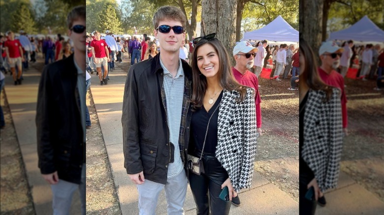 Kaitlan Collins, right, smiling next to a man