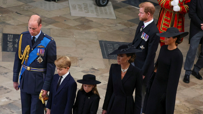 Prince Harry, Meghan Markle, Prince William, and Princess Kate at Queen Elizabeth's funeral