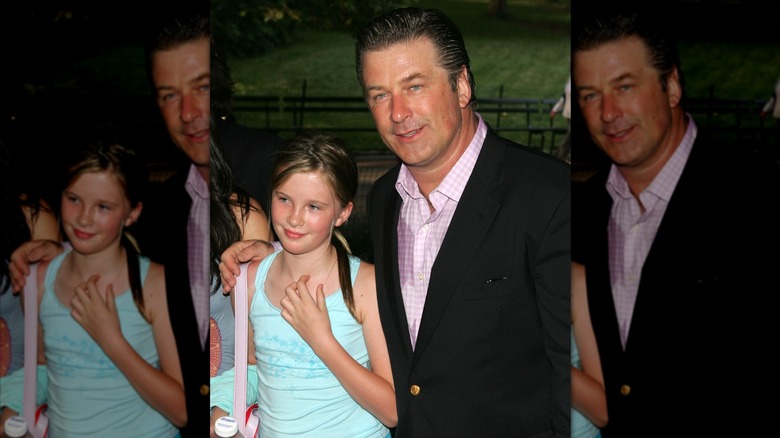 Alec Baldwin with his hand on Ireland Baldwin's shoulder.