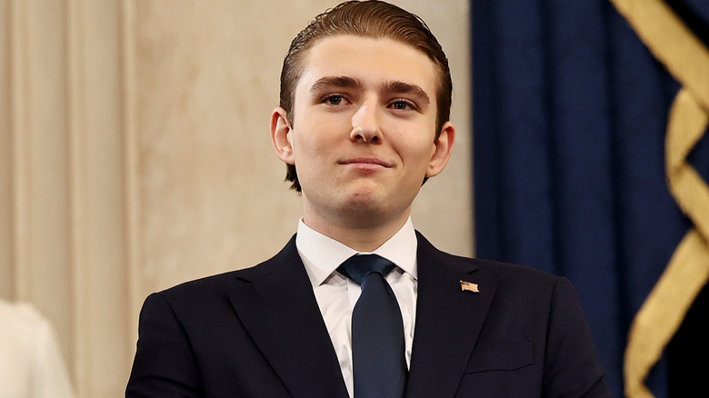 Barron Trump grinning