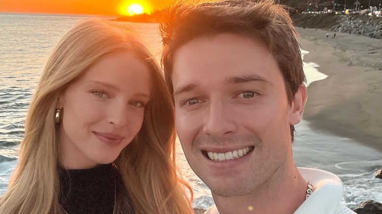 Patrick Schwarzenegger and Abby Champion on the beach at sunset 