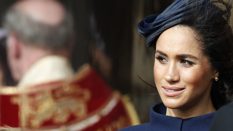 Meghan Markle looking to her right 