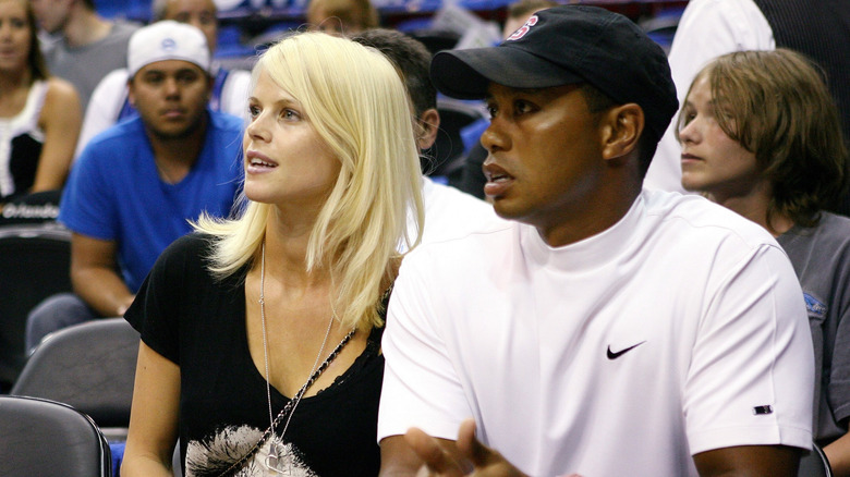 Tiger Woods and Erin Nordegren attending a basketball game in 2009
