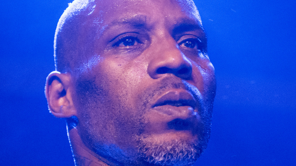 DMX performing on stage with facial hair