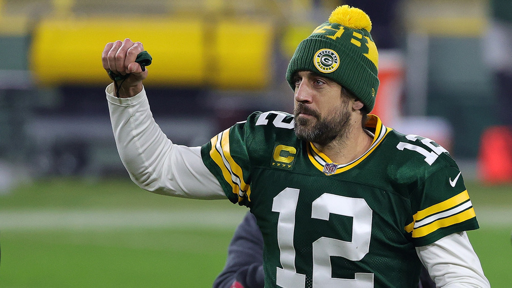 Aaron Rodgers playing football