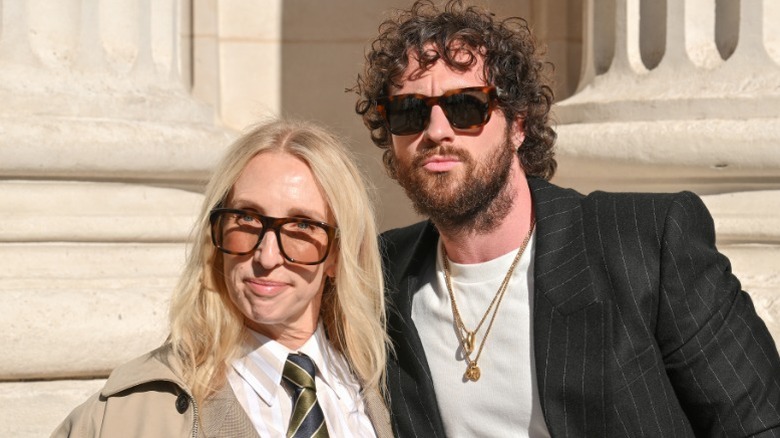 Sam Taylor-Johnson and Aaron Taylor-Johnson attend Paris Fashion Week