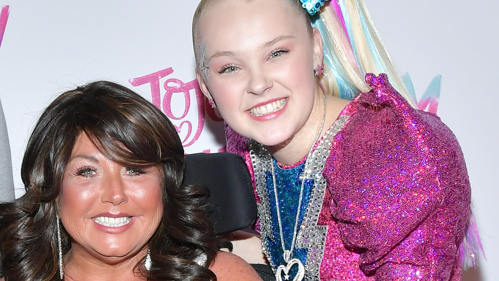 Abby Lee Miller and JoJo Siwa smiling together