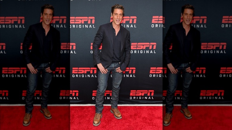 Daivd Muir wearing all black at an ESPN event