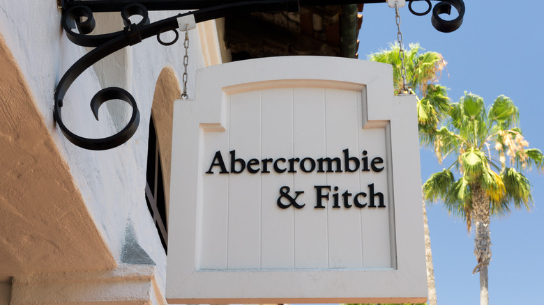 Abercrombie & Fitch sign outside with palm trees in the back