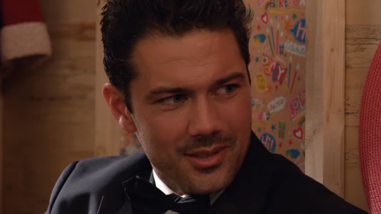 A close up on Ryan Paevey, wearing a tuxedo, in From Friend to Fiancé (2019)