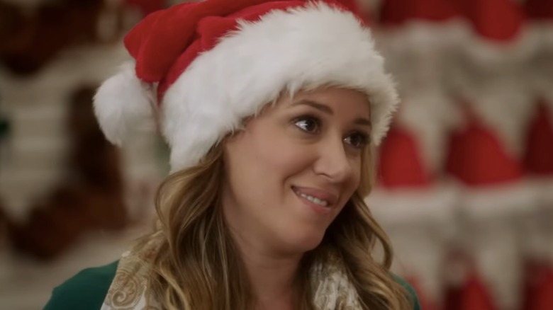 Haylie Duff wearing a Santa hat in Hats Off to Christmas! (2013)