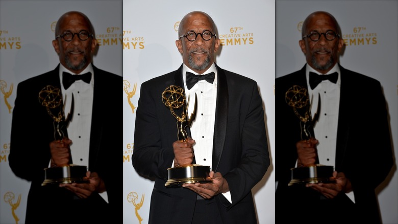 Reg E. Cathey poses with Emmy Award