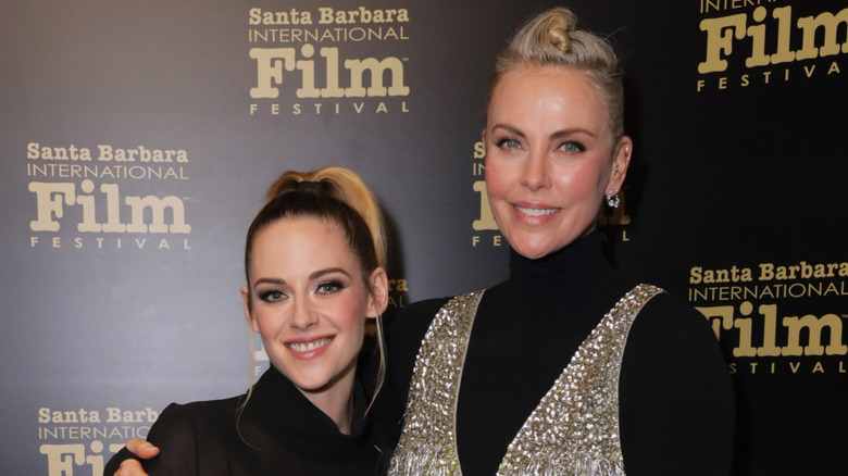 Kristen Stewart and Charlize Theron smiling