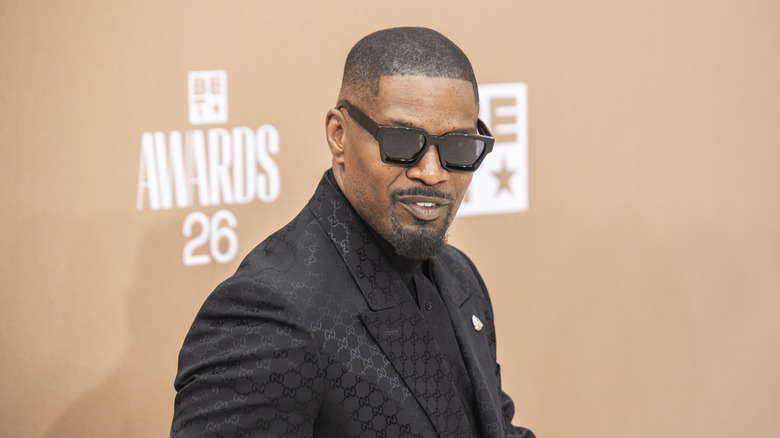 Jamie Foxx in black formals and sunglasses