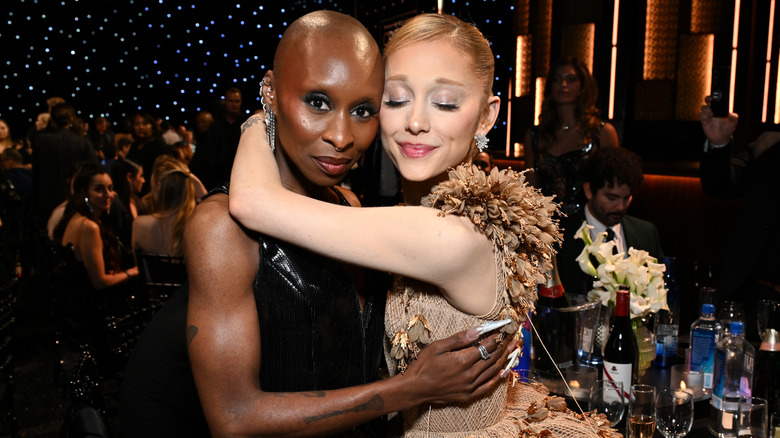 Ariana Grande embracing Cynthia Erivo