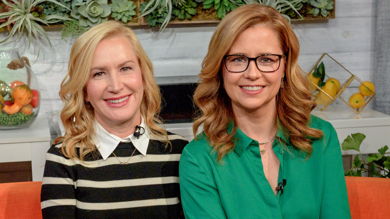Jenna Fischer and Angela Kinsey sitting on a couch