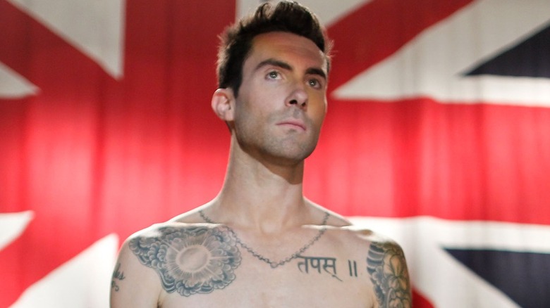 Adam Levine near Union Jack
