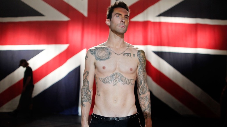 Adam Levine near Union Jack