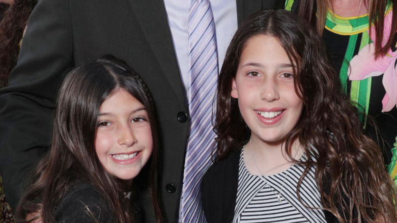 Sadie and Sunny Sandler smiling at the premiere of "Sandy Wexler"