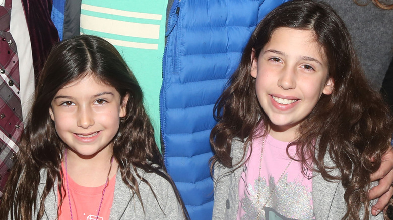 Sadie and Sunny Sandler smiling backstage of the "School of Rock" musical on Broadway