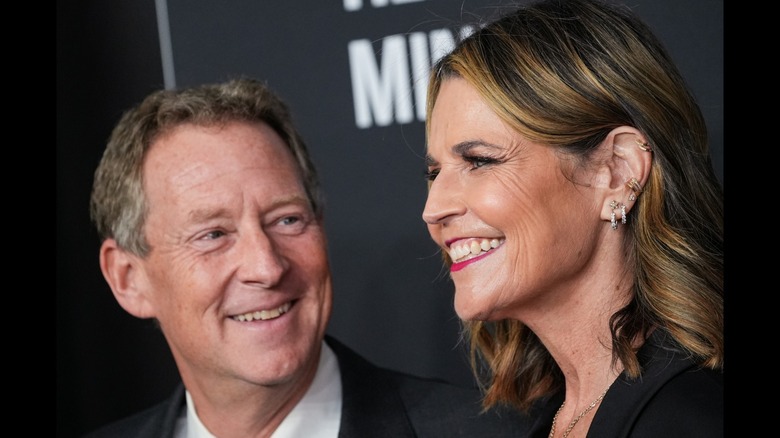 Mike Feldman looking at Savannah Guthrie, both smiling
