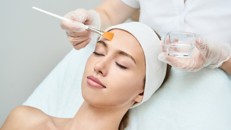Woman getting a facial treatment